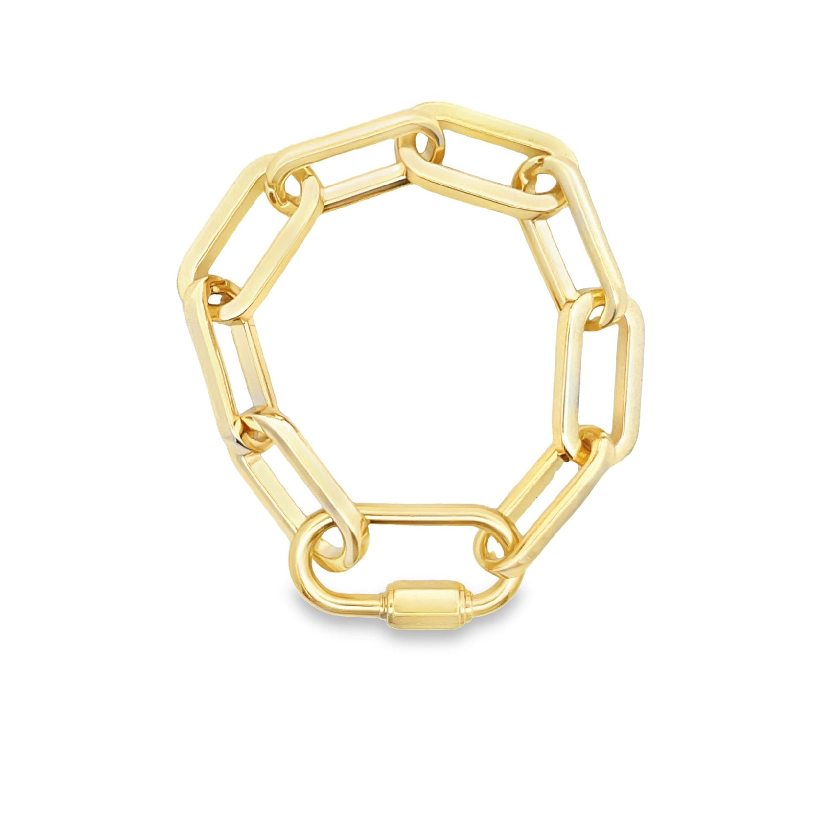 A polished gold link bracelet rests against a clean white background, showcasing its chunky geometric design and secure clasp.