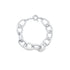 A polished silver chain link bracelet curves gracefully against a clean white background.