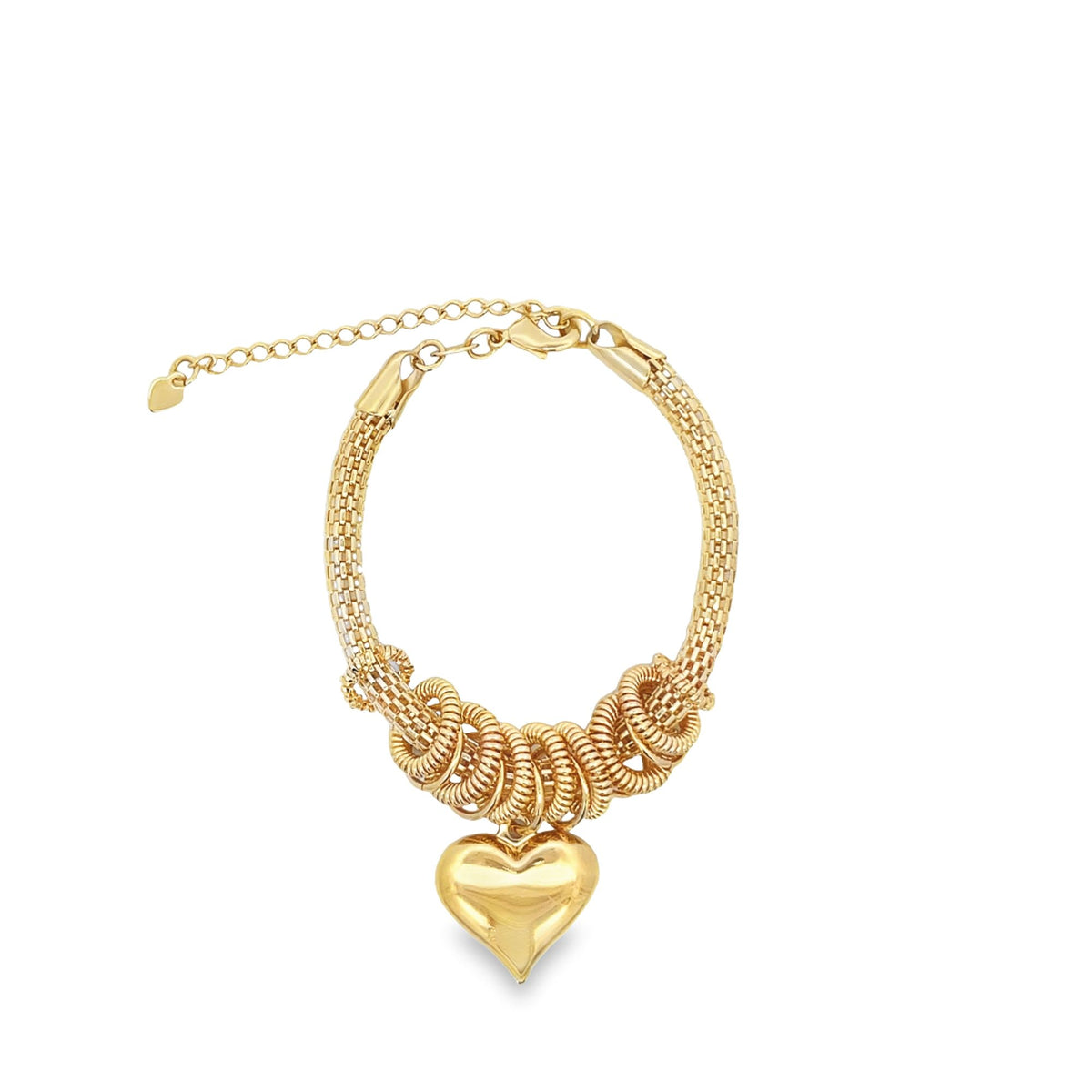 A gold charm bracelet features a chunky mesh band adorned with coiled rings and a polished heart pendant.