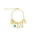A gold charm bracelet features lucky symbols including an evil eye, hamsa hand, horseshoe, and four-leaf clover against a white background.