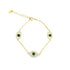 A delicate gold evil eye bracelet features three green gemstone charms outlined with sparkling cubic zirconia crystals.
