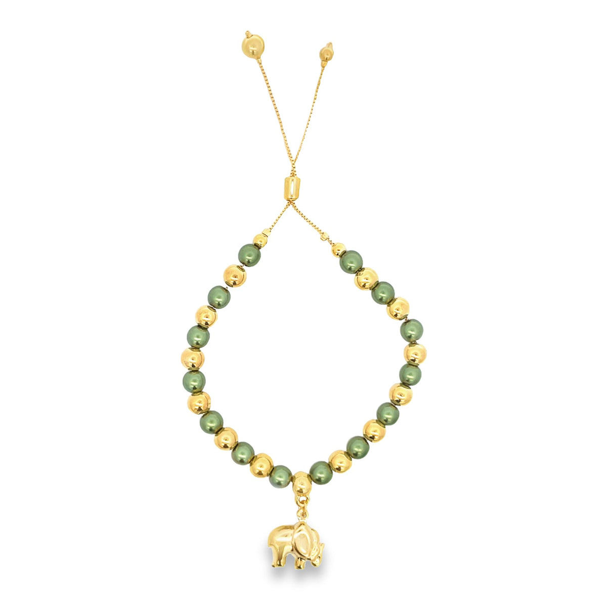 A gold bolo bracelet features alternating green and gold beads with a dangling elephant charm against a white background.