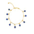 A delicate gold-plated charm bracelet displays multiple blue and white evil eye glass beads dangling from a delicate chain.