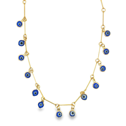 A delicate gold chain necklace displays dangling blue and white evil eye charms against a clean white background.