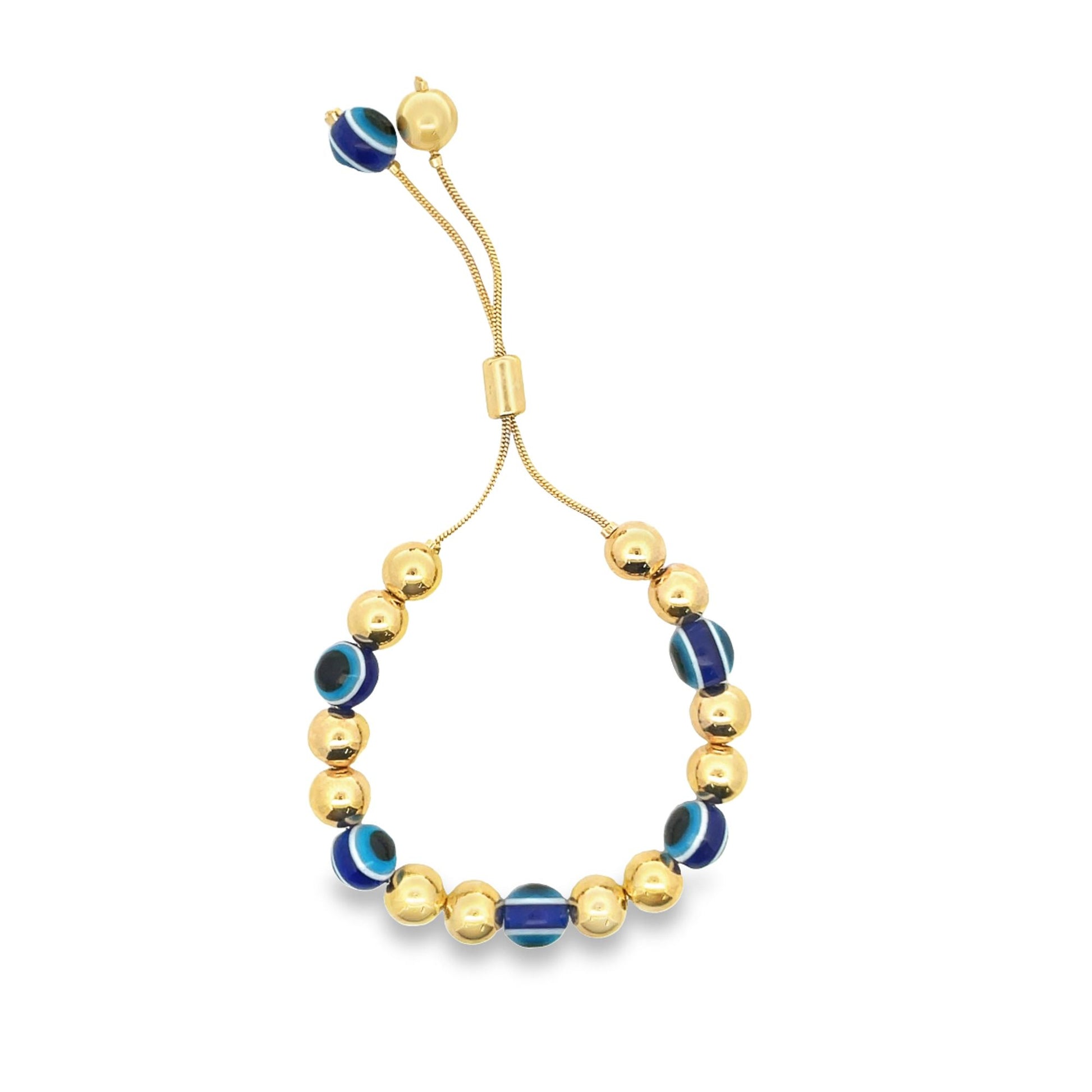 A gold adjustable evil eye bracelet features alternating polished gold beads and blue glass nazar amulets.