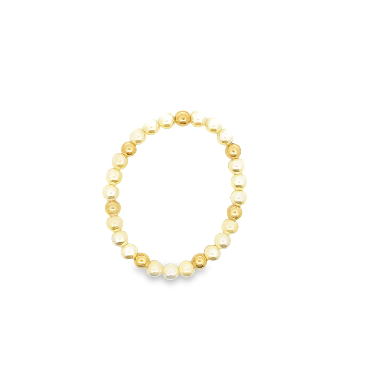 A minimalist gold beaded stretch bracelet rests on a clean white background.