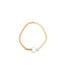 A beaded gold ring features a mother-of-pearl heart charm centered at the bottom.