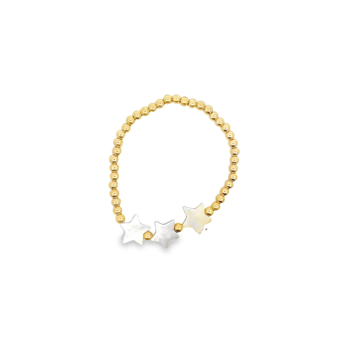 A delicate gold beaded stretch bracelet features three shimmering mother-of-pearl star charms against a clean white background.