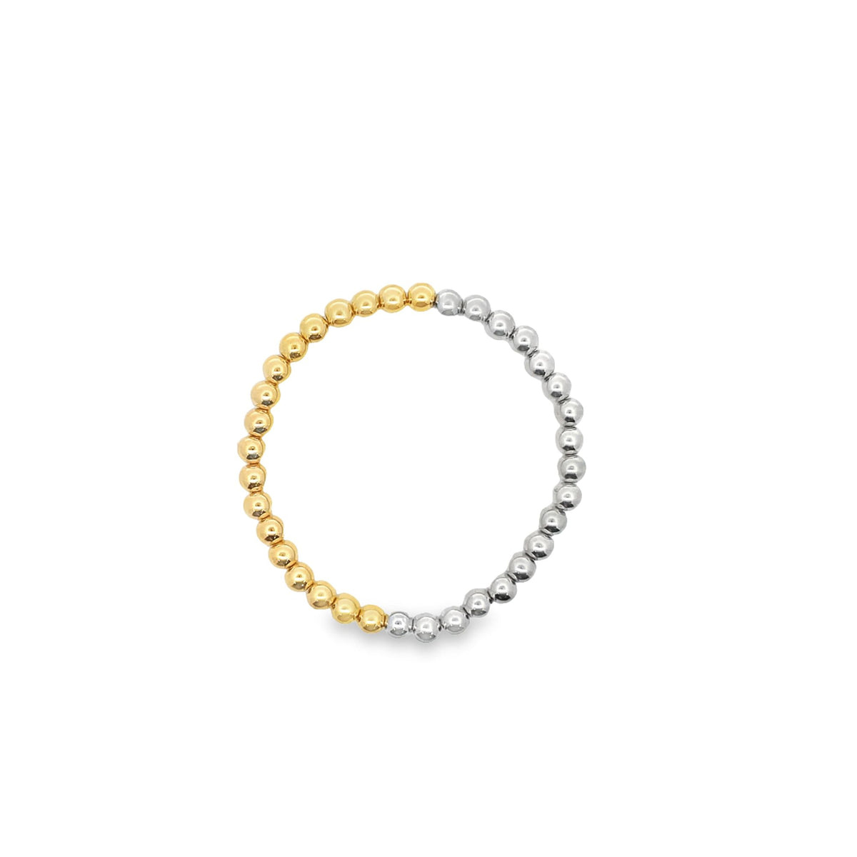 A delicate two-tone ring features alternating yellow and white gold beads arranged in a continuous circle against a clean white background.