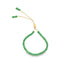An adjustable green seed bead bracelet features delicate gold chains and small matching beads dangling from the closure against a white background.