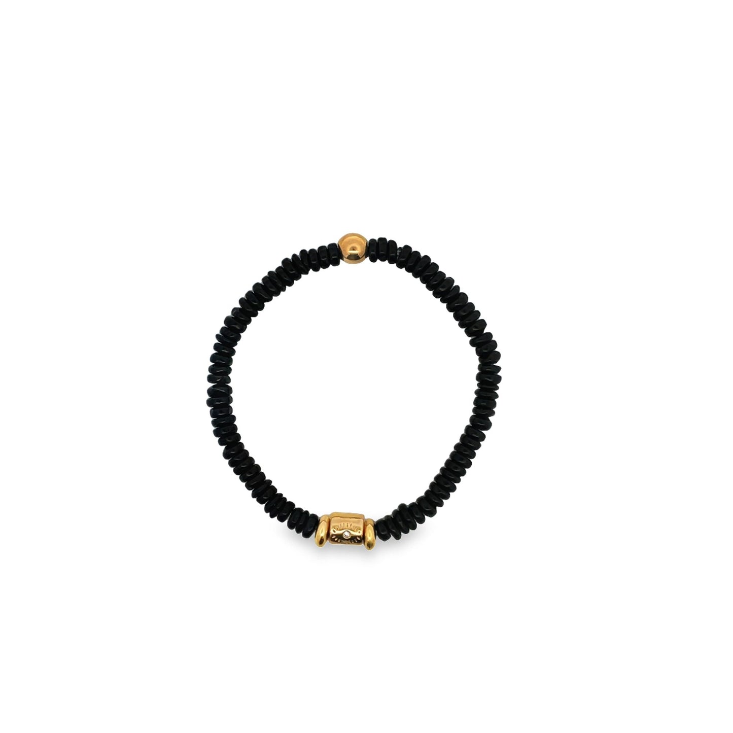 A beaded black bracelet features gold accents, including a central charm and bead, isolated on a white background.