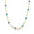 A delicate gold chain necklace features alternating blue evil eye beads and white pearls against a clean white background.