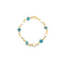A delicate gold chain bracelet features alternating blue evil eye beads and white pearls against a plain white background.
