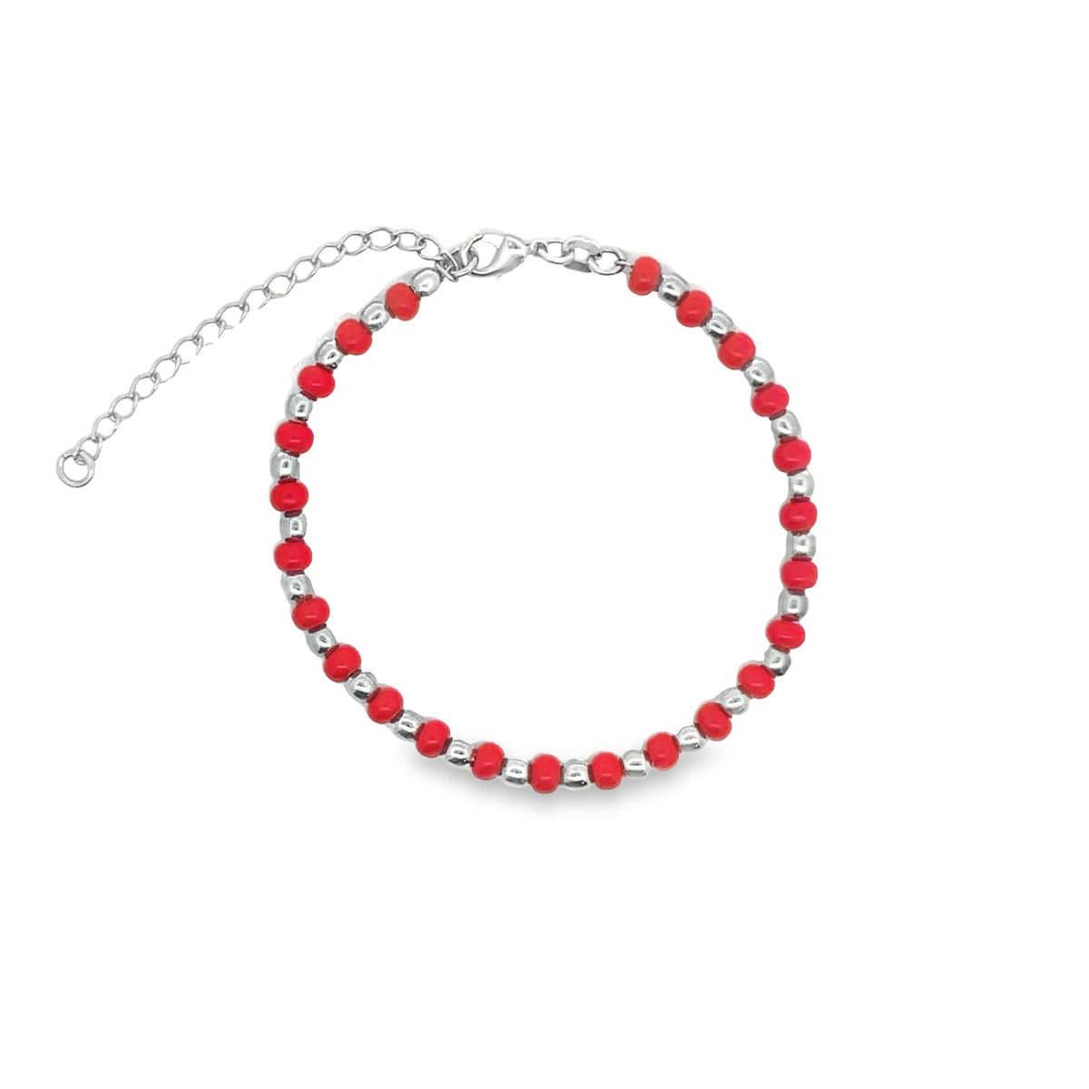 A delicate silver chain bracelet features alternating red and silver beads against a clean white background.