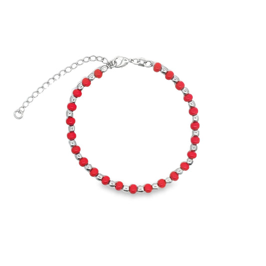 A delicate silver chain bracelet features alternating red and silver beads against a clean white background.