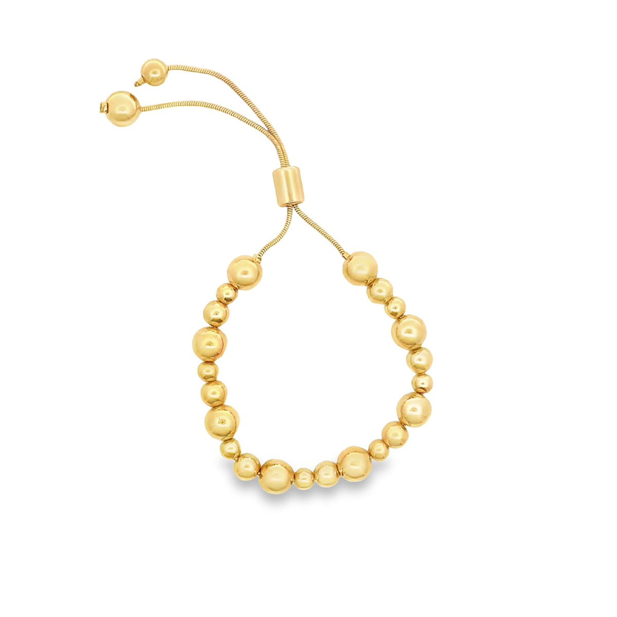 A gleaming yellow gold bolo bracelet features polished spherical beads of graduating sizes along an adjustable chain.