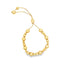 A gleaming yellow gold bolo bracelet features polished spherical beads of graduating sizes along an adjustable chain.