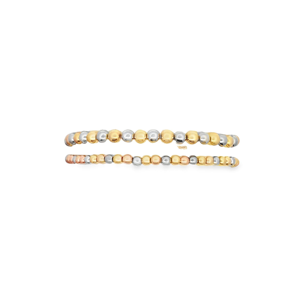 Two tricolor gold bead stretch bracelets rest horizontally against a plain white background.