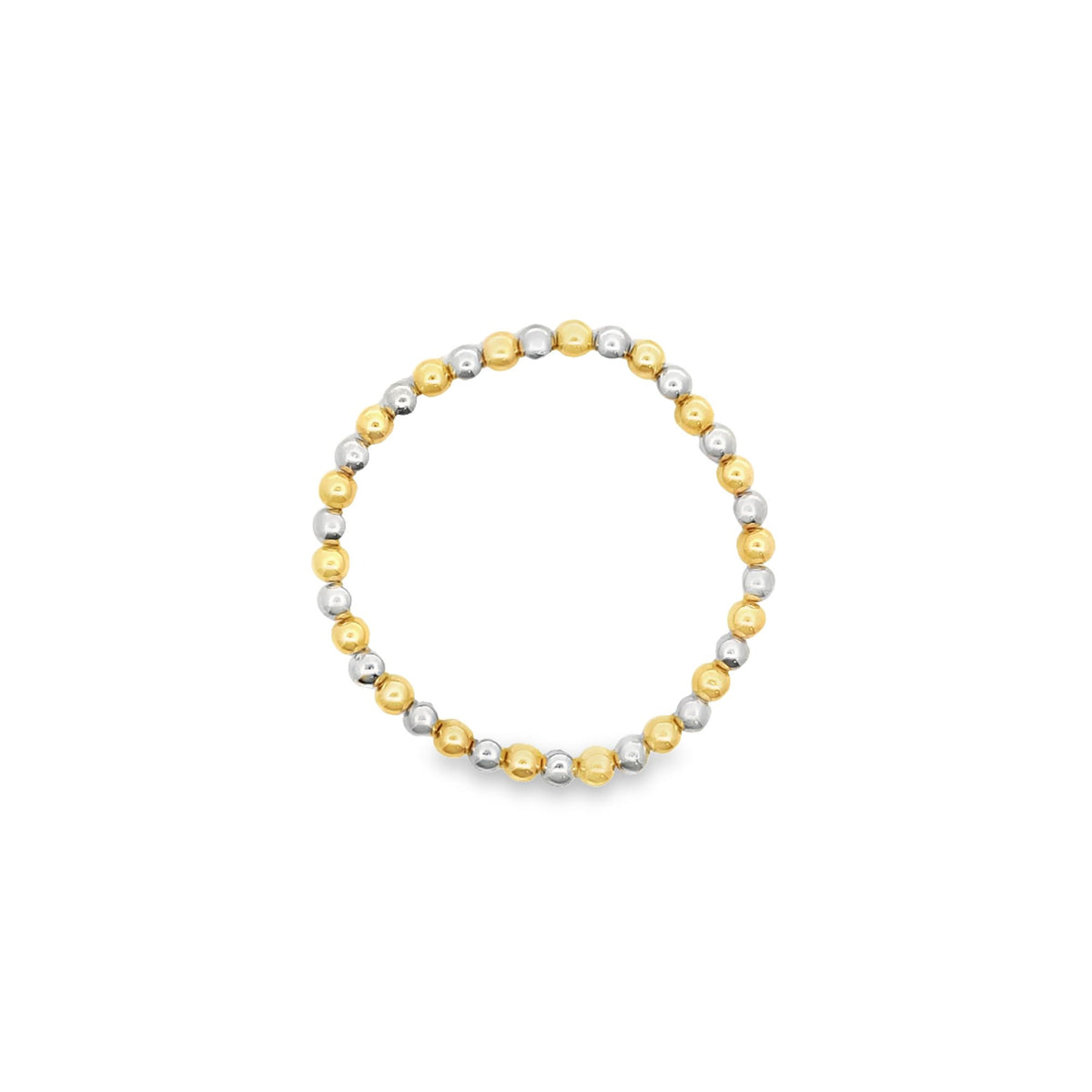 A delicate beaded ring showcases alternating gold and silver spheres arranged in a continuous circle against a clean white background.