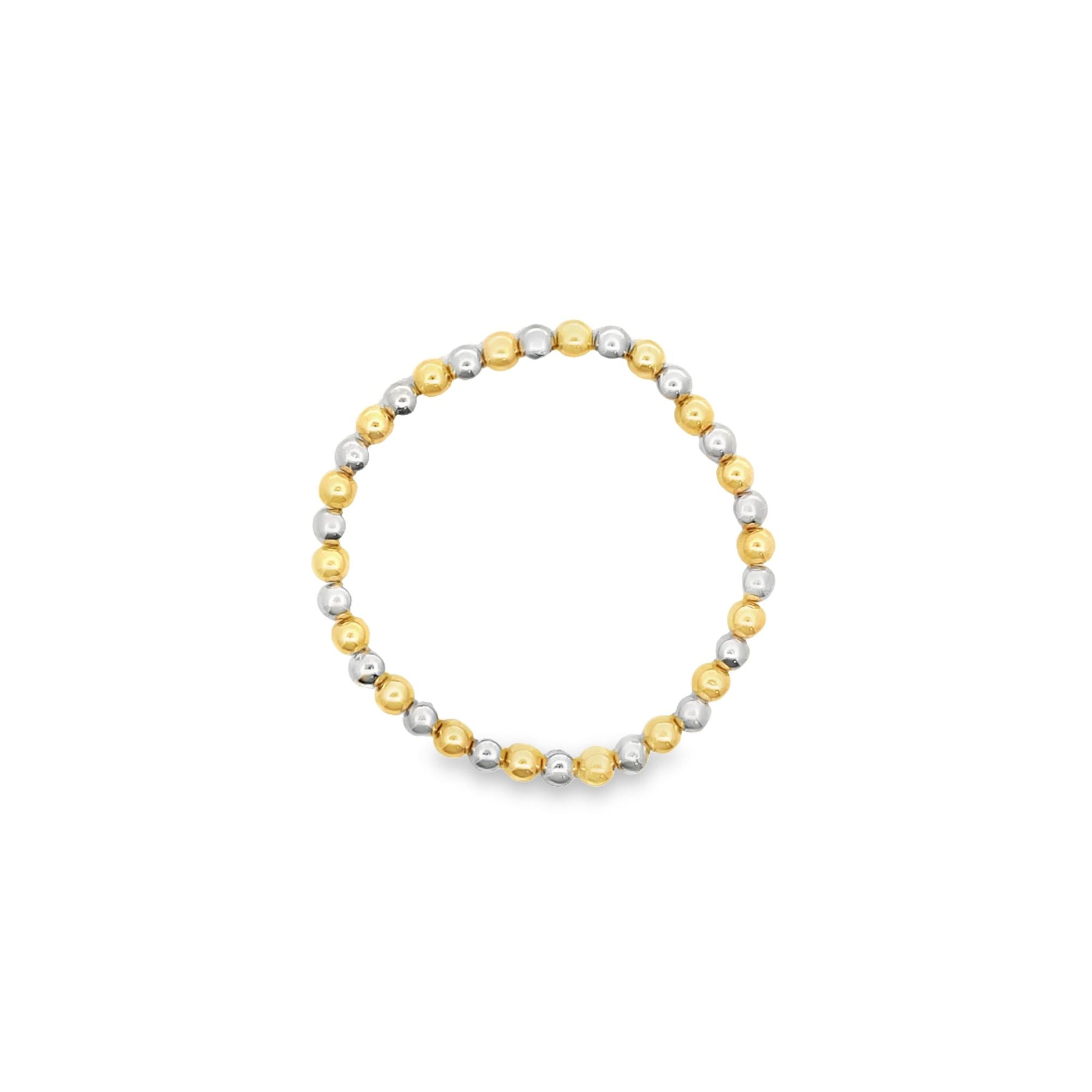 A delicate beaded ring showcases alternating gold and silver spheres arranged in a continuous circle against a clean white background.