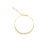 A delicate gold chain bracelet features a strand of tiny beads along the bottom curve and an adjustable clasp.