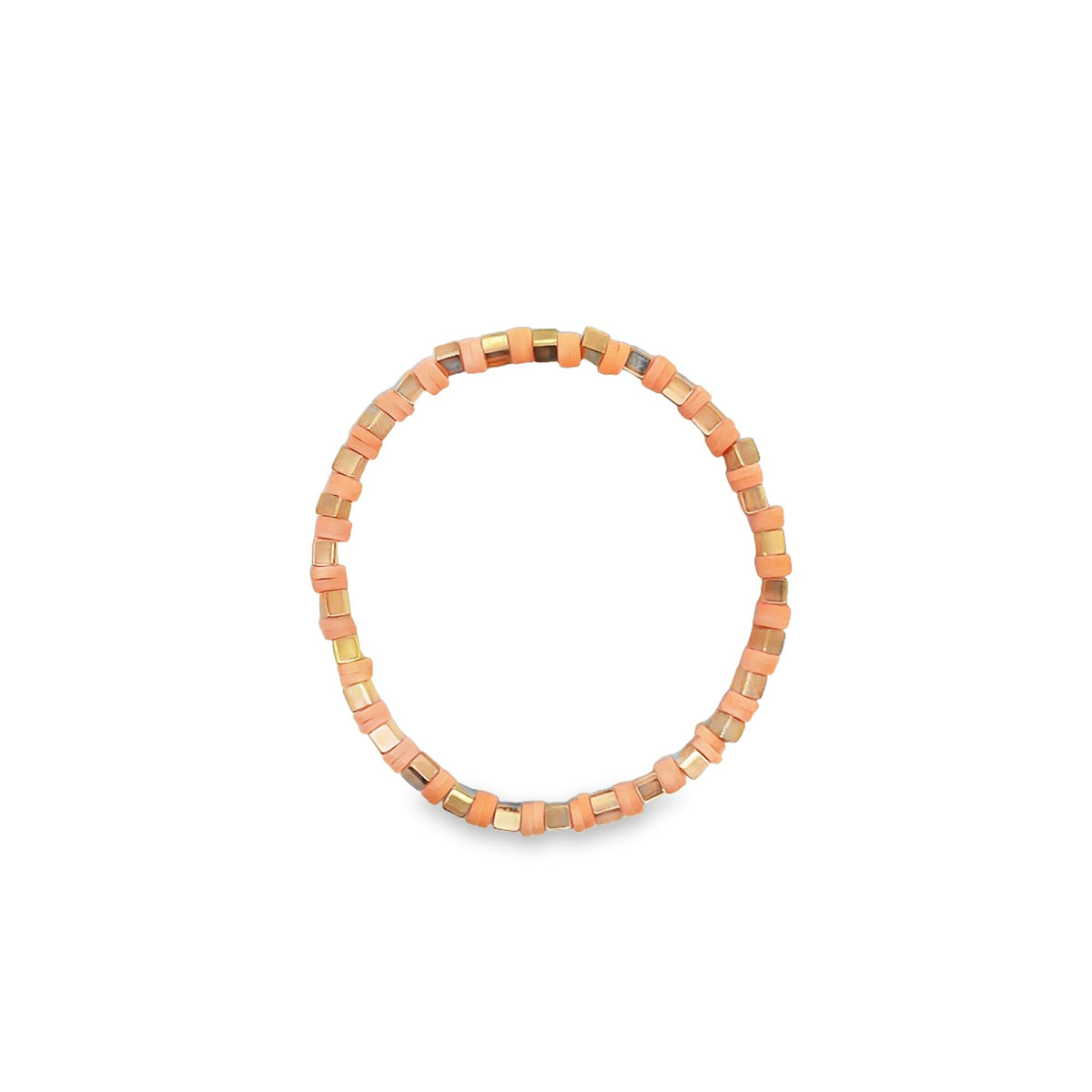 A handmade beaded stretch ring featuring alternating peach-colored heishi disks and small gold spacer cubes rests against a plain white background.