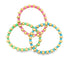 Three stacked handmade beaded stretch bracelets feature alternating metallic gold spheres and colorful neon polymer clay disc beads in pink, green, and blue.