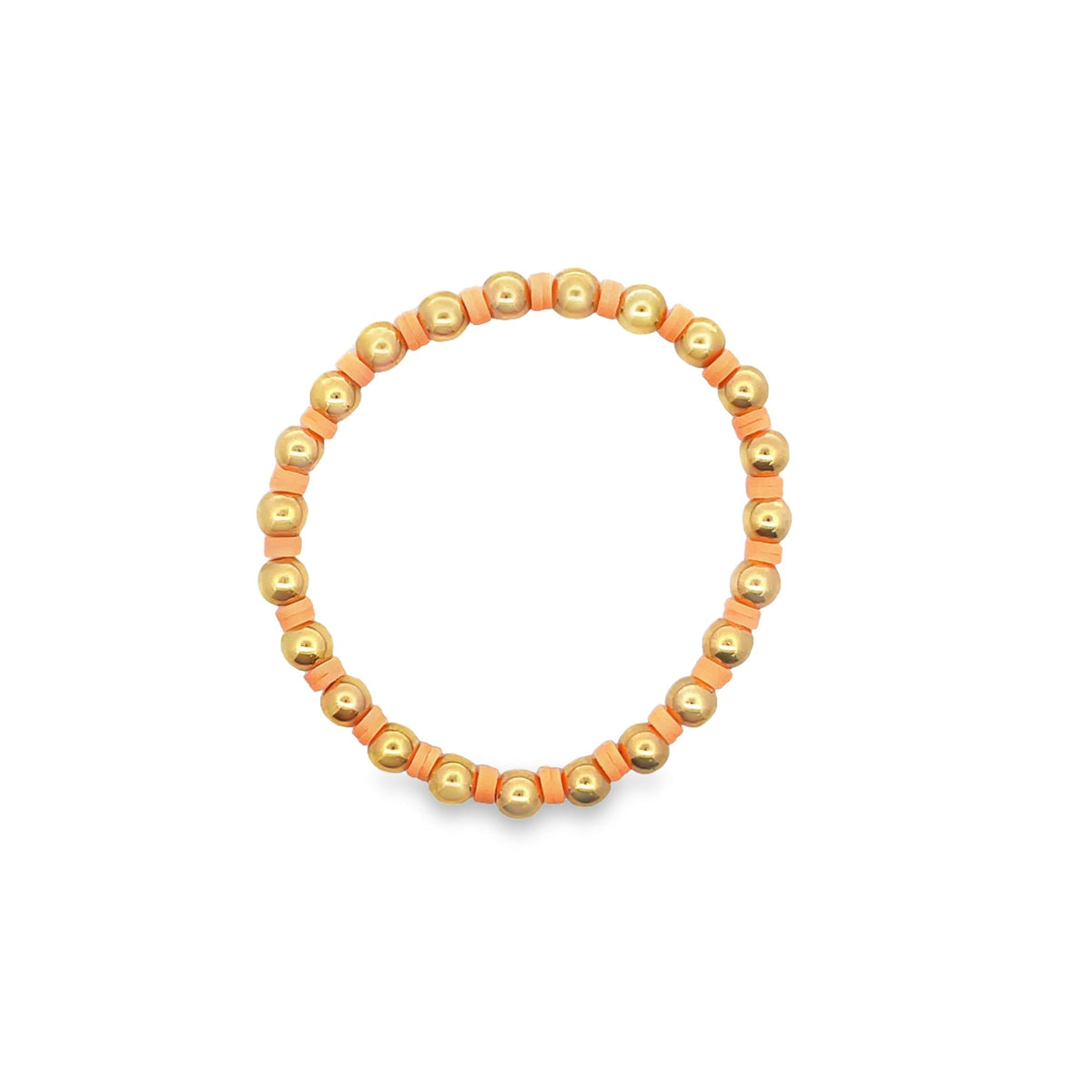 A handmade beaded bracelet features alternating metallic gold spheres and peach-colored clay disc spacers in a circular arrangement against a clean white background.