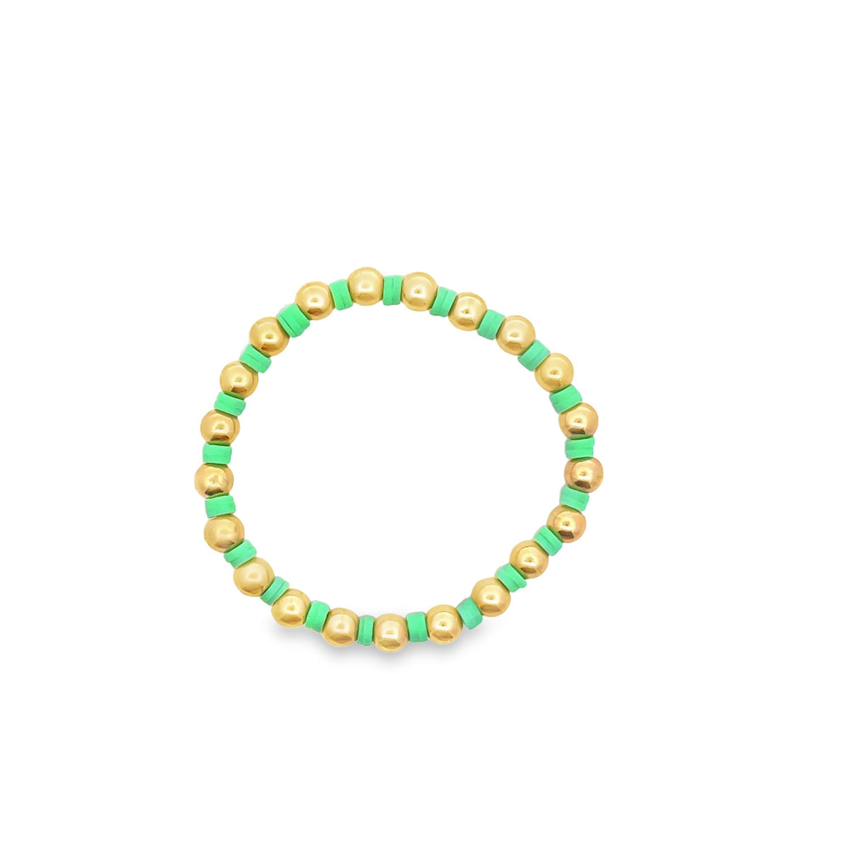 A handmade beaded bracelet features alternating metallic gold spheres and bright green disc beads arranged in a circle against a clean white background.