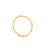 A gold beaded stretch ring features a small star charm centered at the bottom against a plain white background.