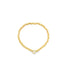 A delicate gold beaded stretch ring features a single diamond accent stone centered at the bottom against a clean white background.