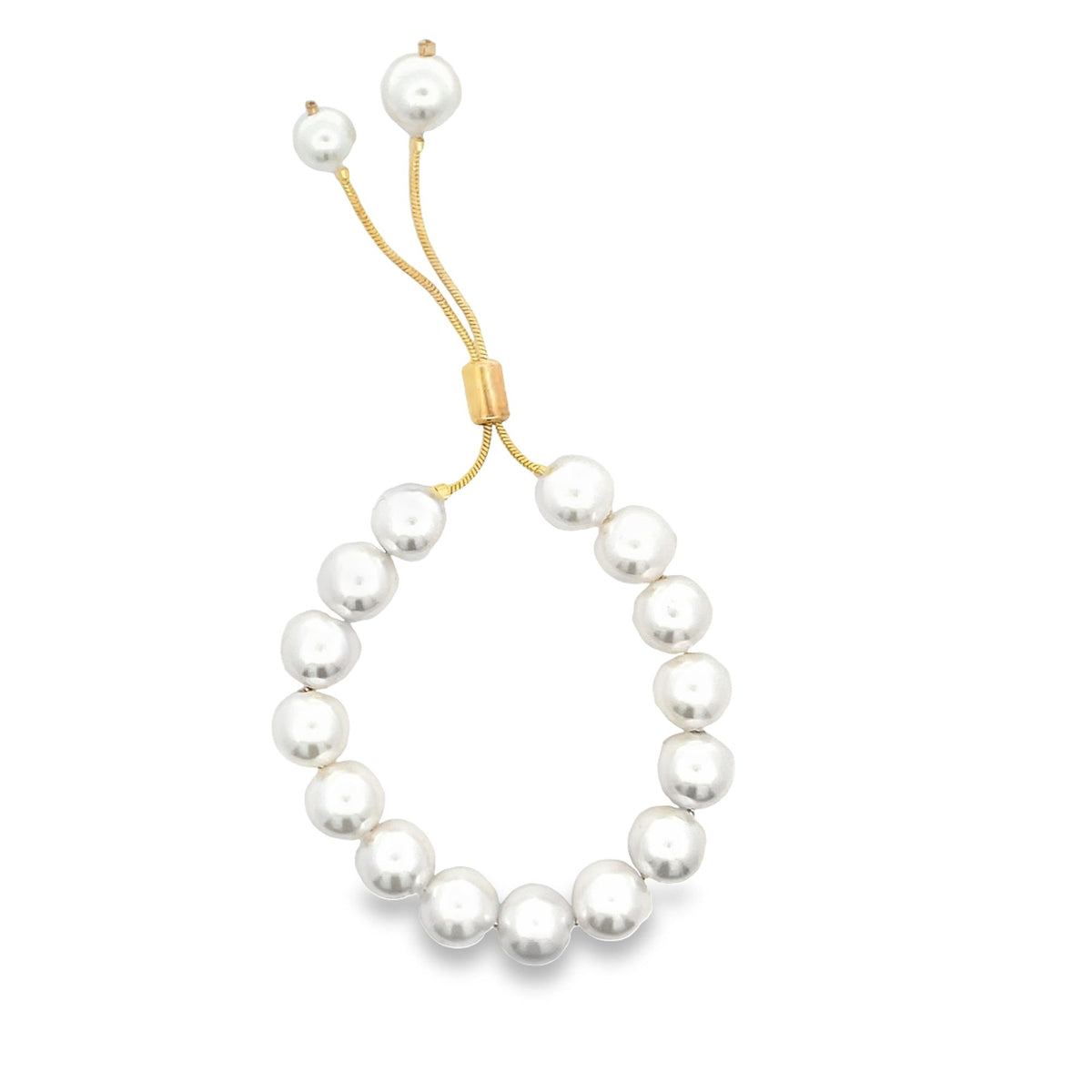 An elegant adjustable pearl bracelet features glossy white pearls strung on a delicate gold chain with a slider mechanism.