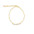A delicate gold chain bracelet features evenly spaced shiny beads and an adjustable extender clasp.