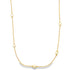 A delicate gold chain necklace features scattered white pearls and polished gold beads along its length.