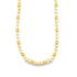 A shiny gold bead necklace drapes gracefully against a plain white background.