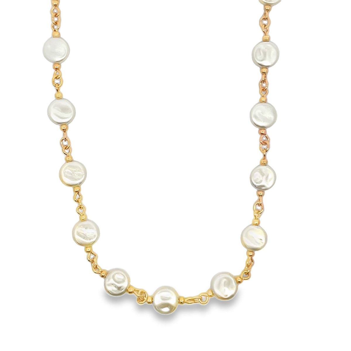 A delicate gold chain necklace features evenly spaced flat white pearls against a plain white background.