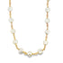 A delicate gold chain necklace features evenly spaced flat white pearls against a plain white background.