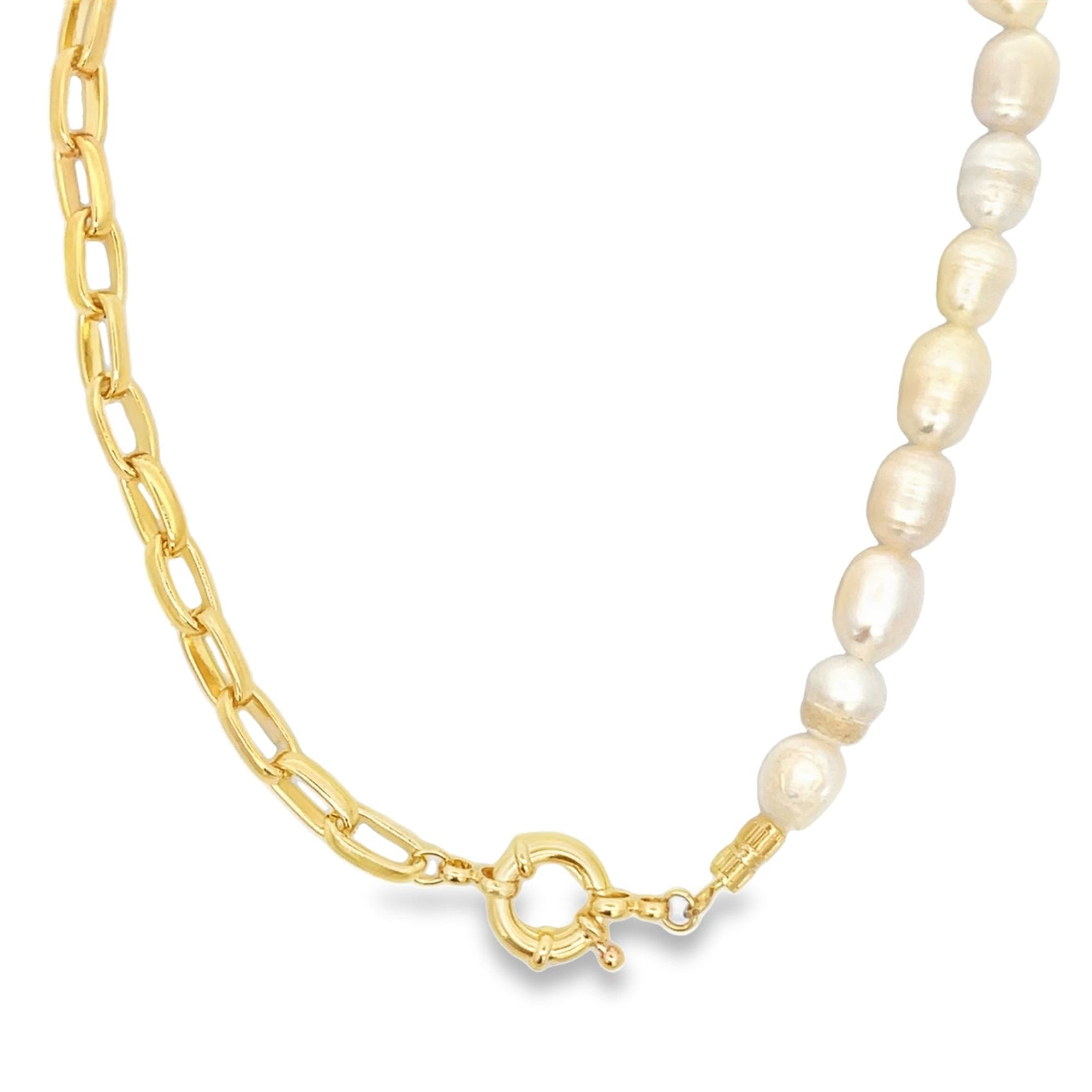 A trendy gold link chain and freshwater pearl half-and-half necklace rests against a white background.