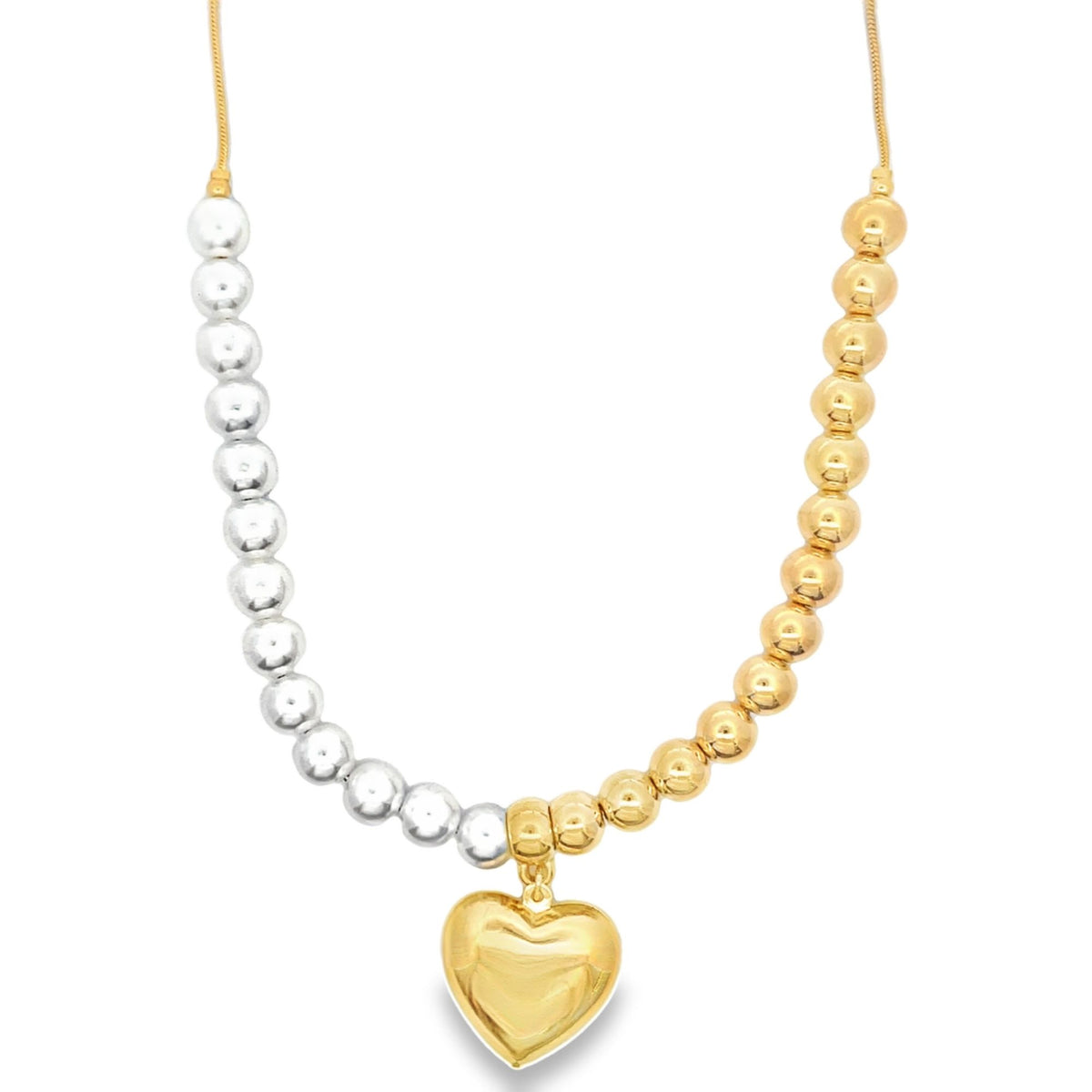 A two-tone beaded necklace features silver beads on the left and gold beads on the right, centered with a polished gold heart pendant.