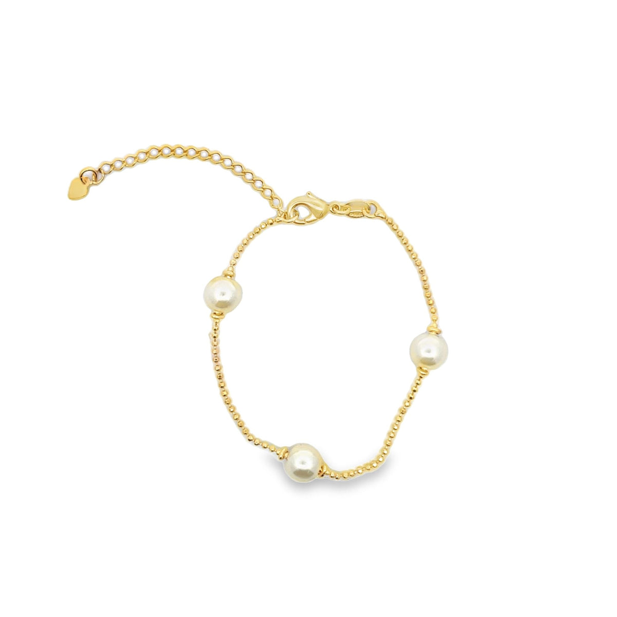 A delicate gold bead bracelet features three evenly spaced white pearls and an adjustable extension chain against a clean white background.