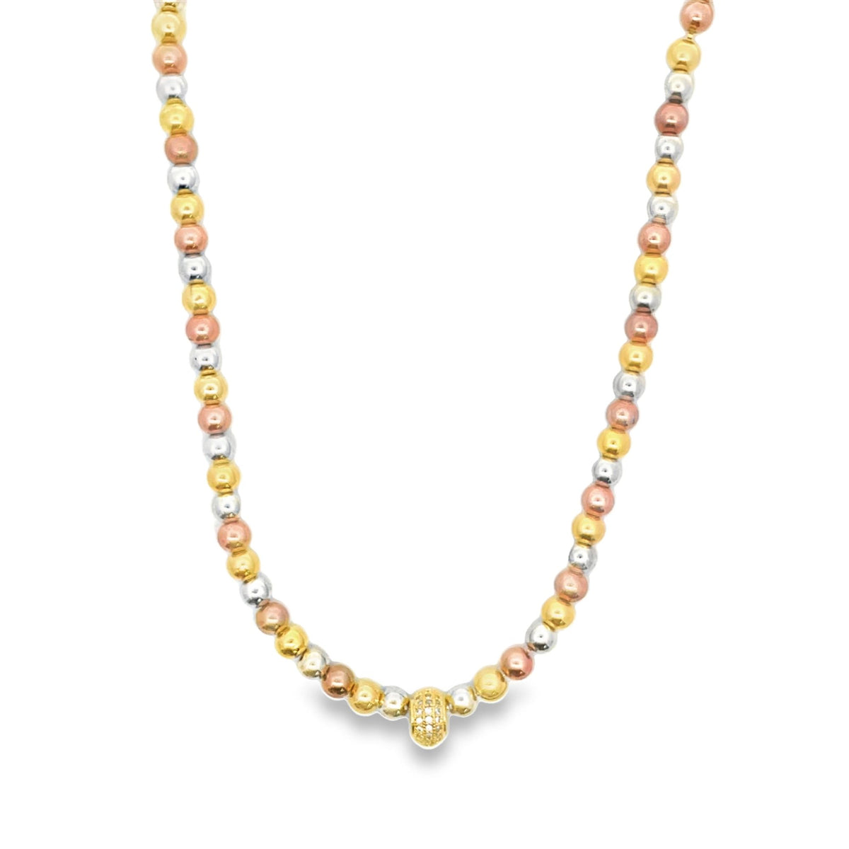 A tri-color gold bead necklace features alternating spheres of yellow, white, and rose gold with a pave diamond centerpiece.