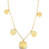 A delicate gold chain necklace dangles five ornate coin pendants against a white background.