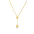 A delicate gold lariat necklace features a sliding bead and a hanging pendant against a white background.