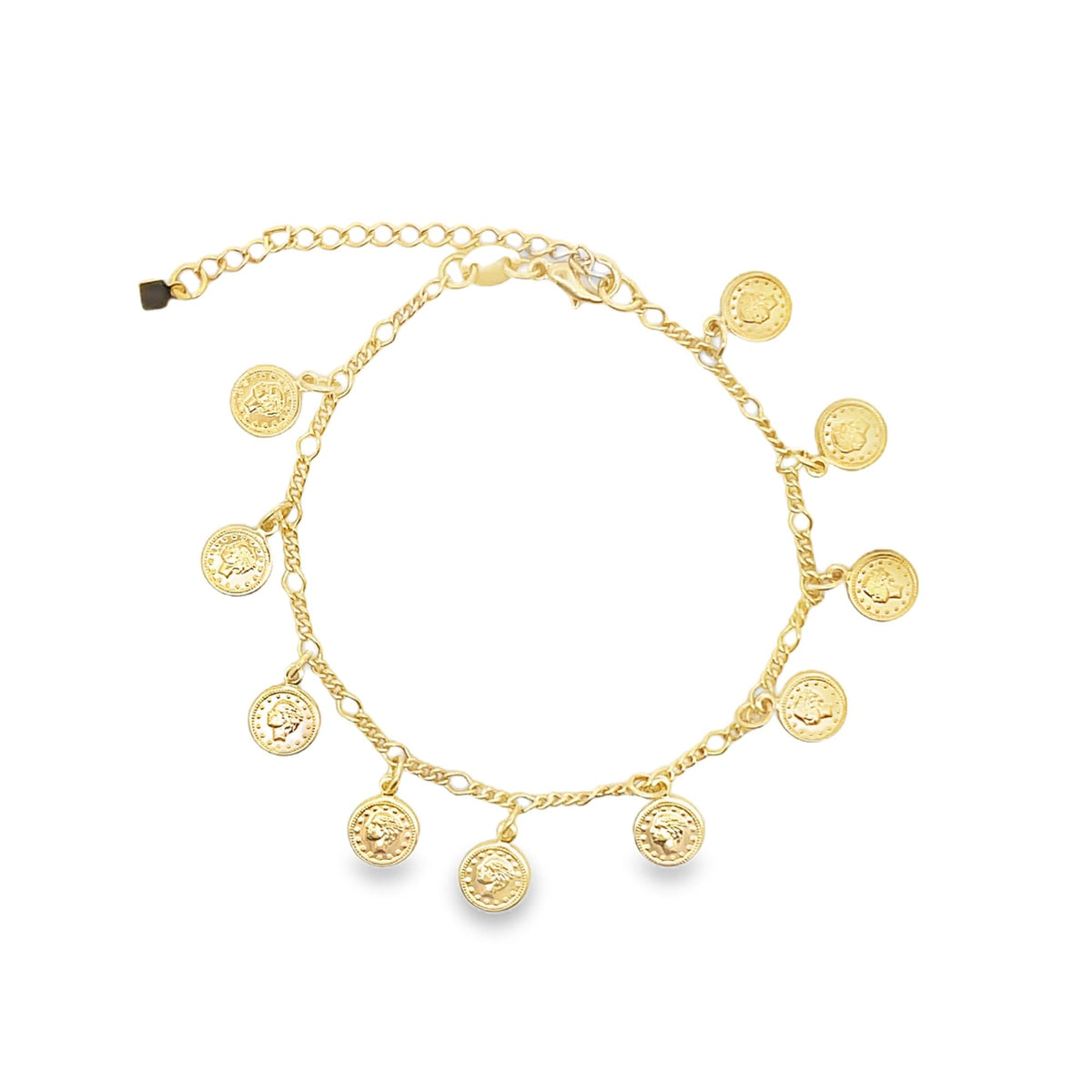 A delicate gold charm bracelet displays hanging coin pendants against a white background.