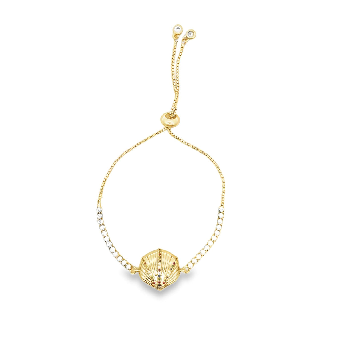 A gold seashell slider bracelet adorned with sparkling cubic zirconia crystals and colorful gemstone accents rests against a clean white background.