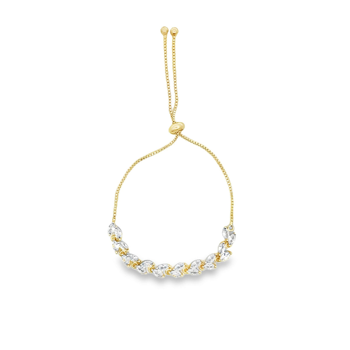 A gold bolo bracelet features a curved line of sparkling marquise-cut cubic zirconia crystals along the lower band.