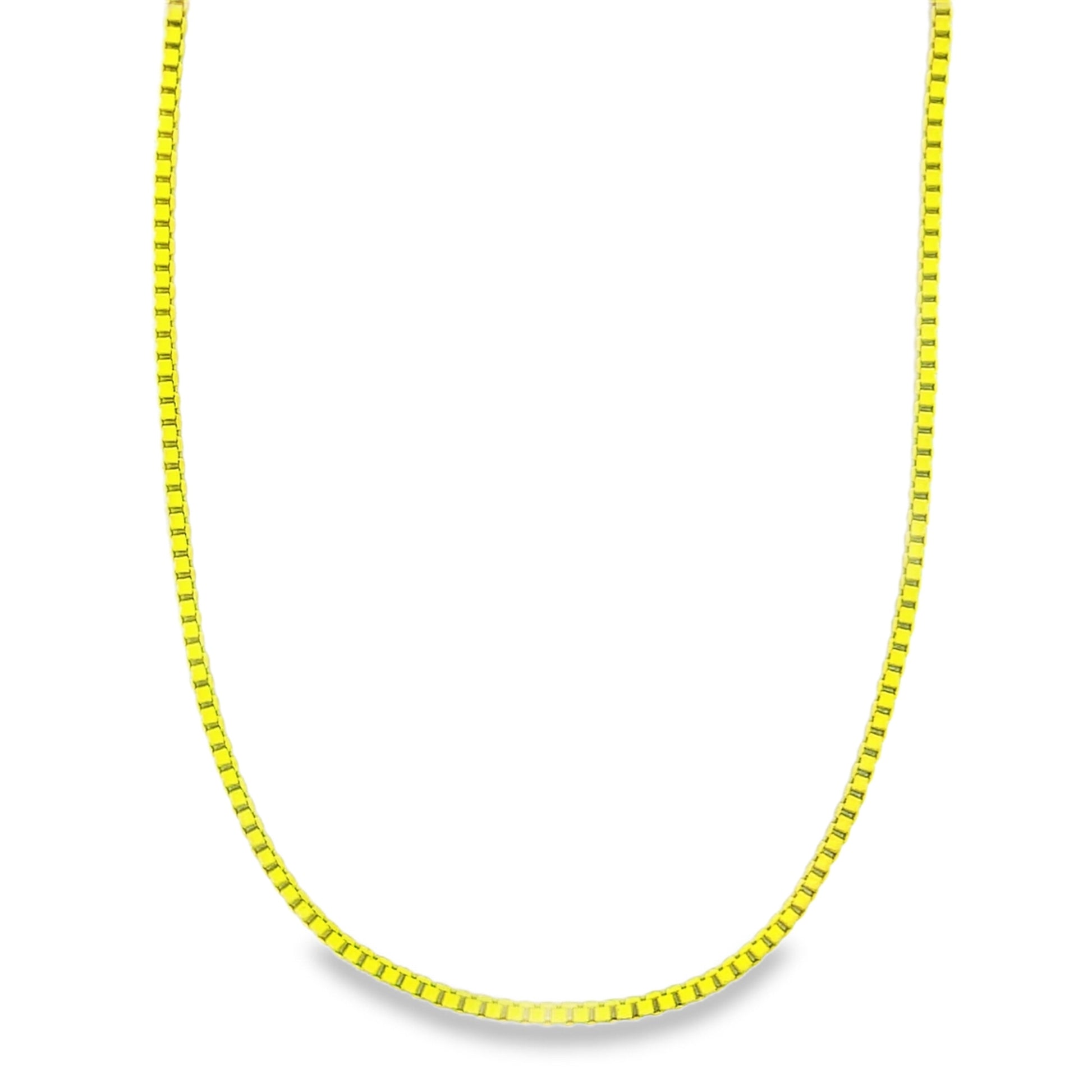 A bright yellow gold box chain necklace hangs in a graceful curve against a plain white background.