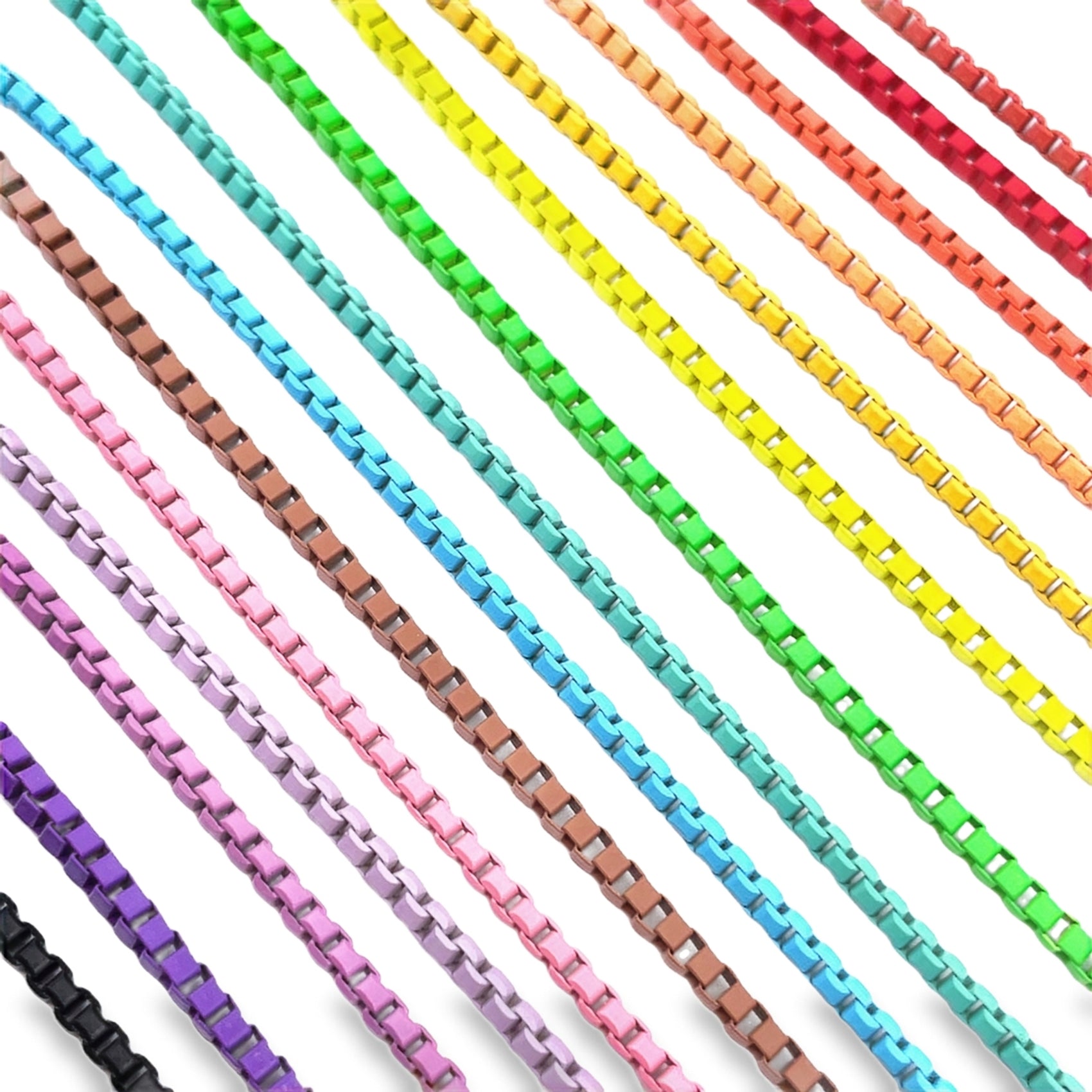Colorful porcelain-coated Venetian box chains run diagonally across a clean white background, showcasing a vibrant rainbow gradient from black to red.