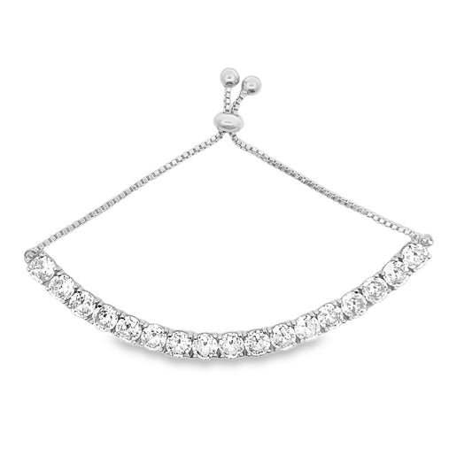 A silver bolo bracelet sparkles with a curved line of round cubic zirconia stones against a clean white background.