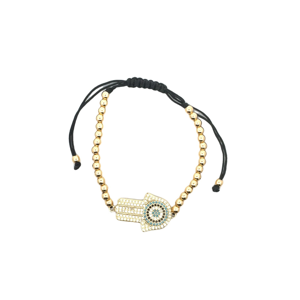 A gold Hamsa hand charm bracelet features sparkling CZ stones and an evil eye accent on an adjustable black cord.
